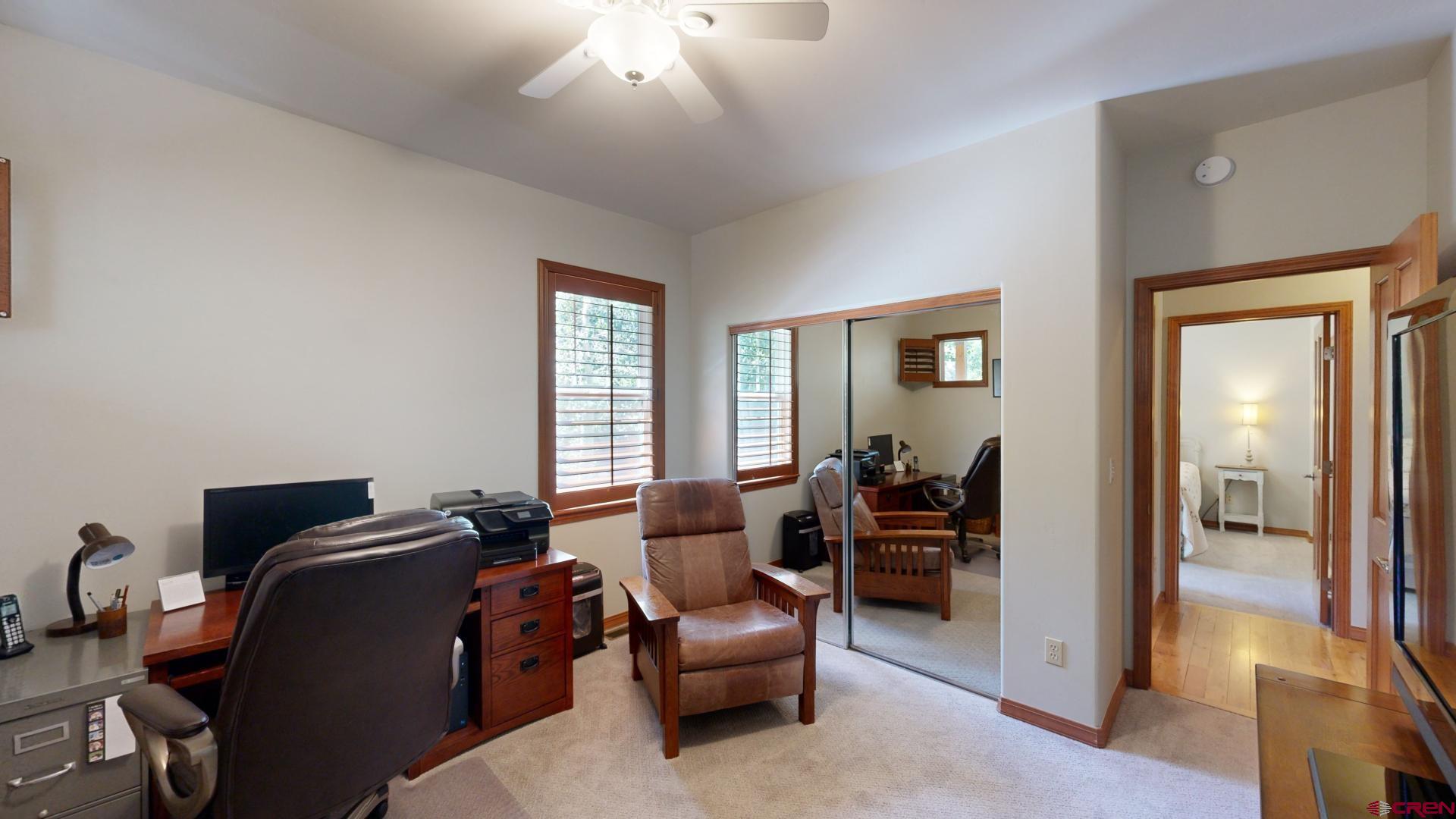 222 Jenkins Ranch Road Durango, CO 81301 - Photo 26 of 30 a living room with furniture and a window