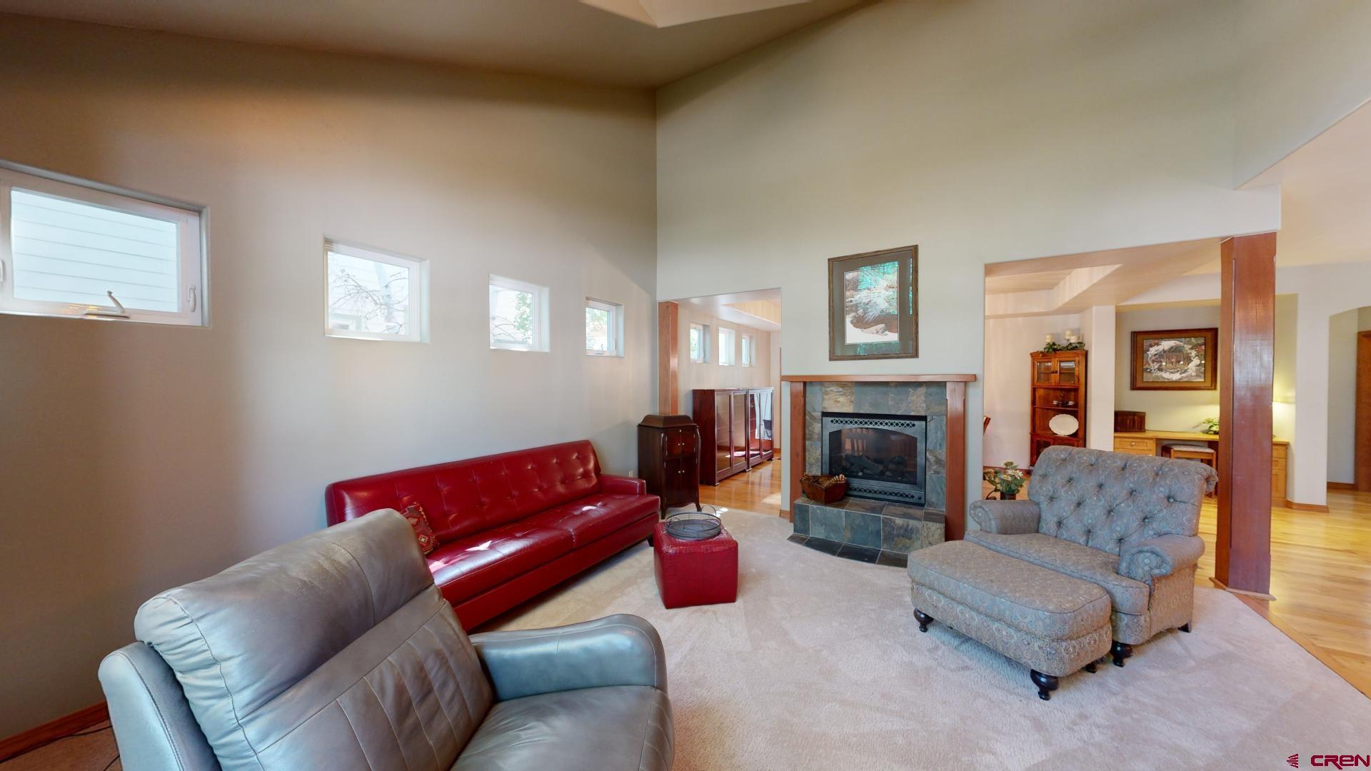 222 Jenkins Ranch Road Durango, CO 81301 - Photo 7 of 30 a living room with furniture and a fireplace