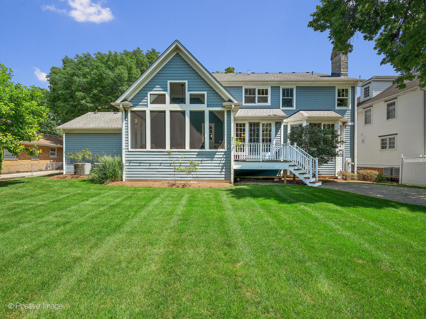 610 Washington Street Elmhurst, IL 60126 - Photo 12 of 48 a front view of a house with a yard