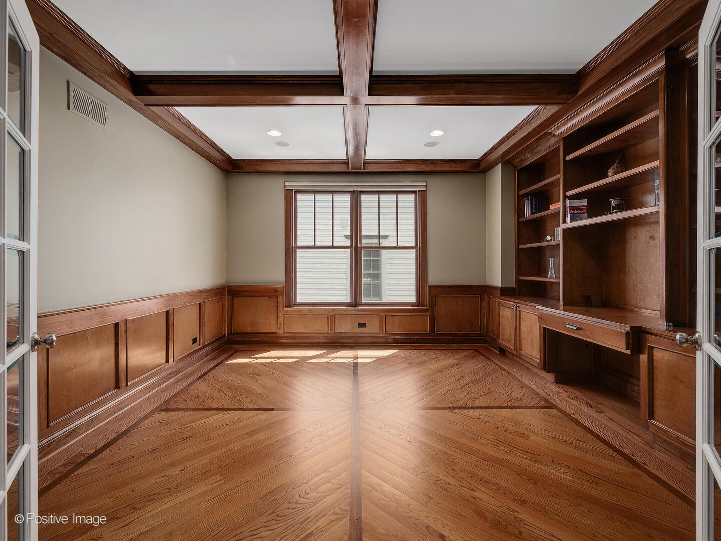 610 Washington Street Elmhurst, IL 60126 - Photo 16 of 48 a view of an empty room with a window and wooden floor