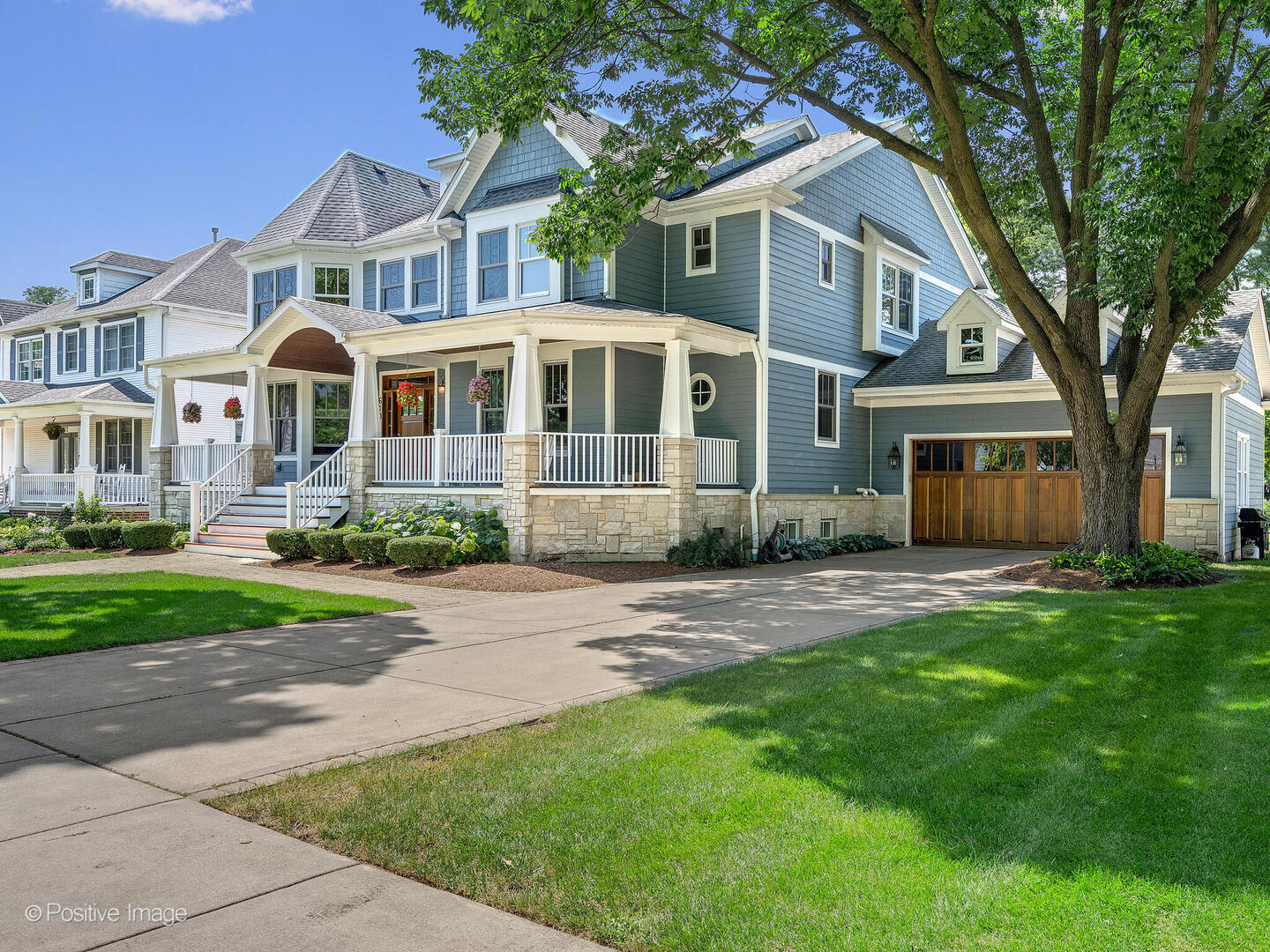 610 Washington Street Elmhurst, IL 60126 - Photo 2 of 48 a front view of a house with a garden