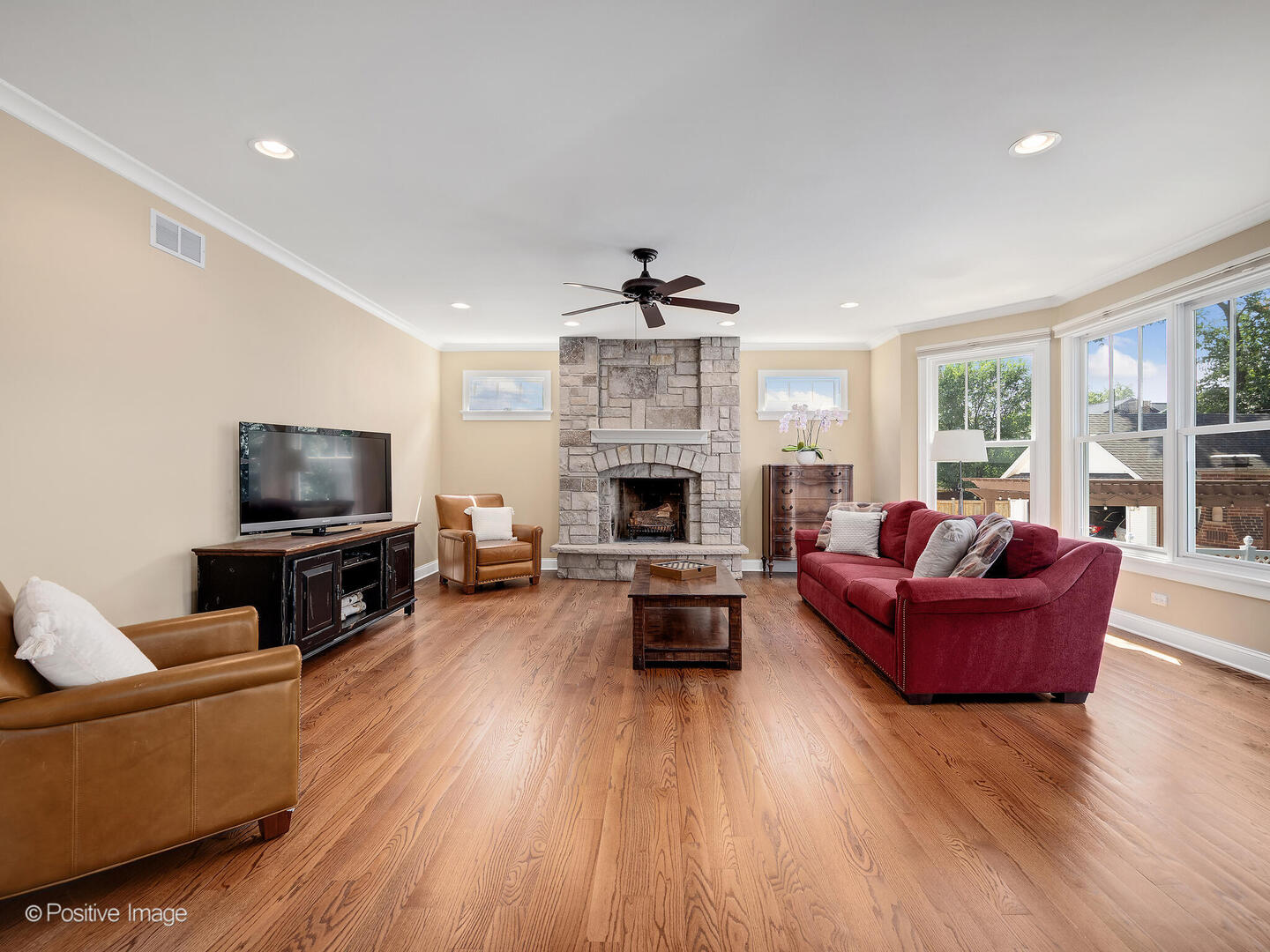 610 Washington Street Elmhurst, IL 60126 - Photo 30 of 48 a living room with furniture fireplace and flat screen tv