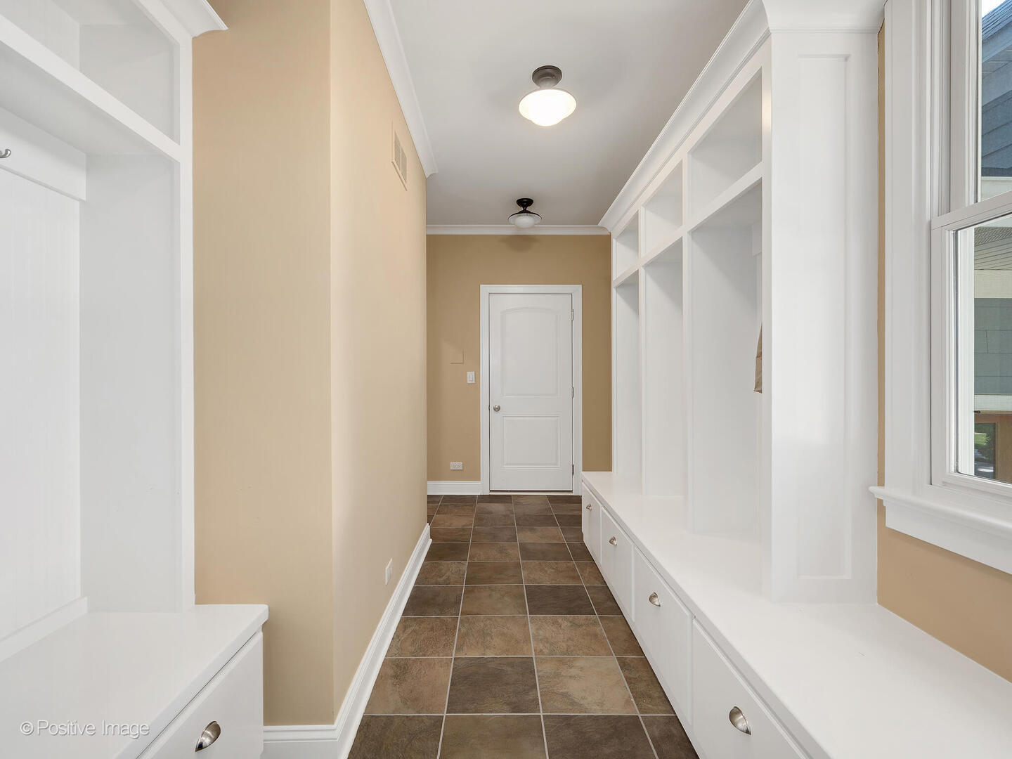 610 Washington Street Elmhurst, IL 60126 - Photo 33 of 48 a view of a hallway with wooden floor and a bathroom