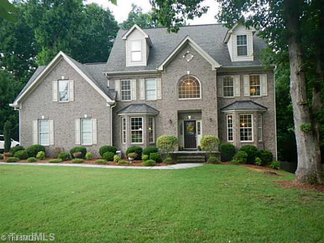 7807 Wilson Farm Road Summerfield, NC 27358 - Photo 1 of 16 Exterior Front. Perfect front yard and flat driveway.