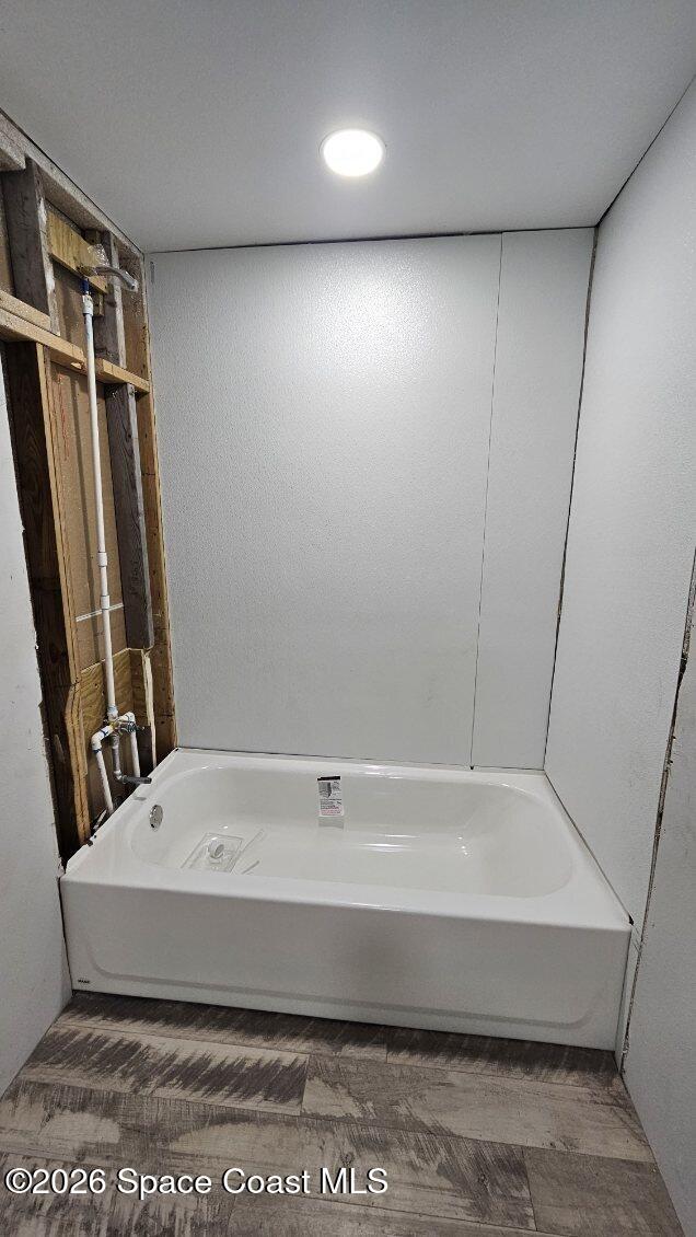 1925 Monticello Avenue Merritt Island, FL 32952 - Photo 14 of 17 a bathroom with a bathtub and a shower