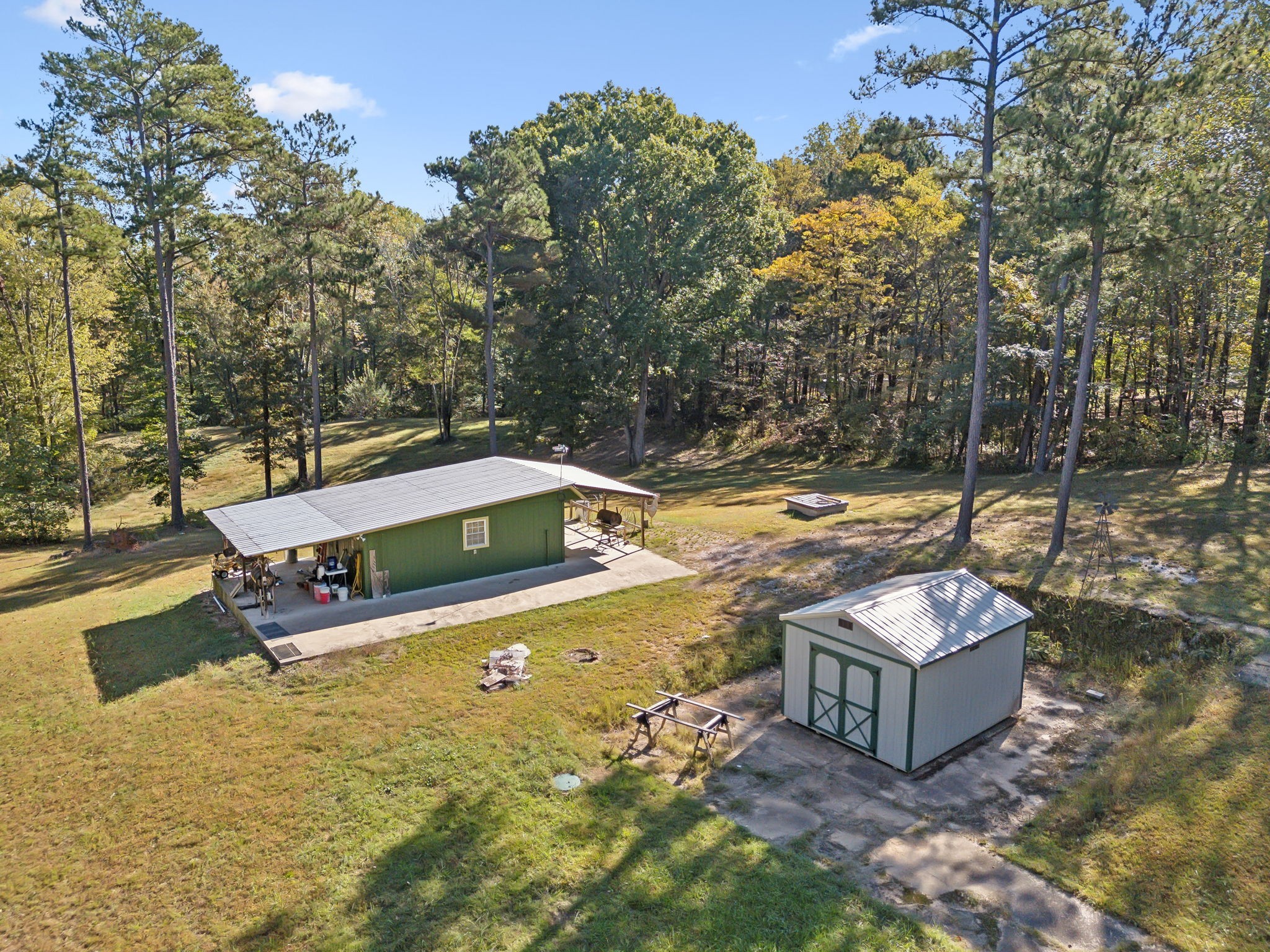 534 Whitney Branch Road Springville, TN 38256 - Photo 9 of 41 a view of a swimming pool with a patio
