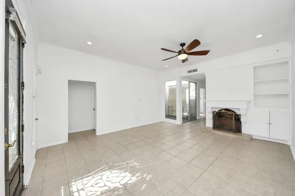 a view of an empty room and window