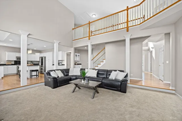 a bathroom with a sink vanity mirror and toilet