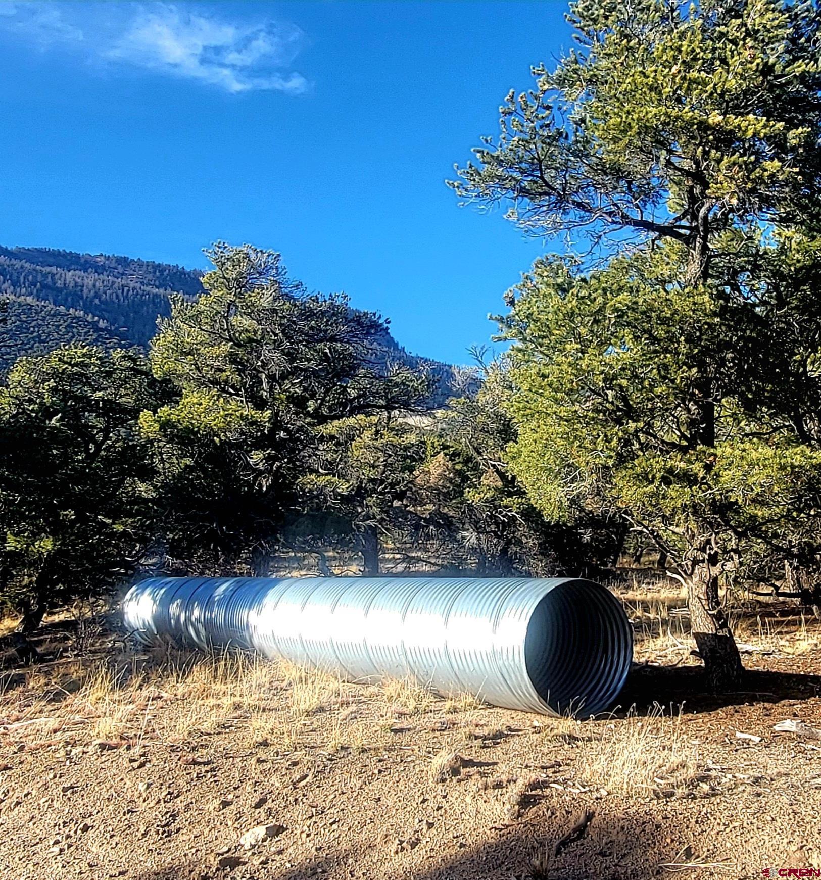 1094-1343 Valley View Road South Fork, CO 81154 - Photo 17 of 37 a view of a lake from a yard