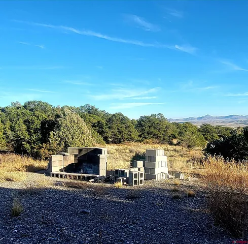 a view of ocean with sunset