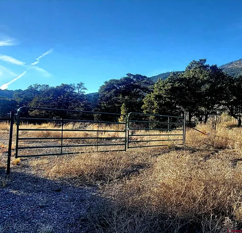a view of a lake with a house