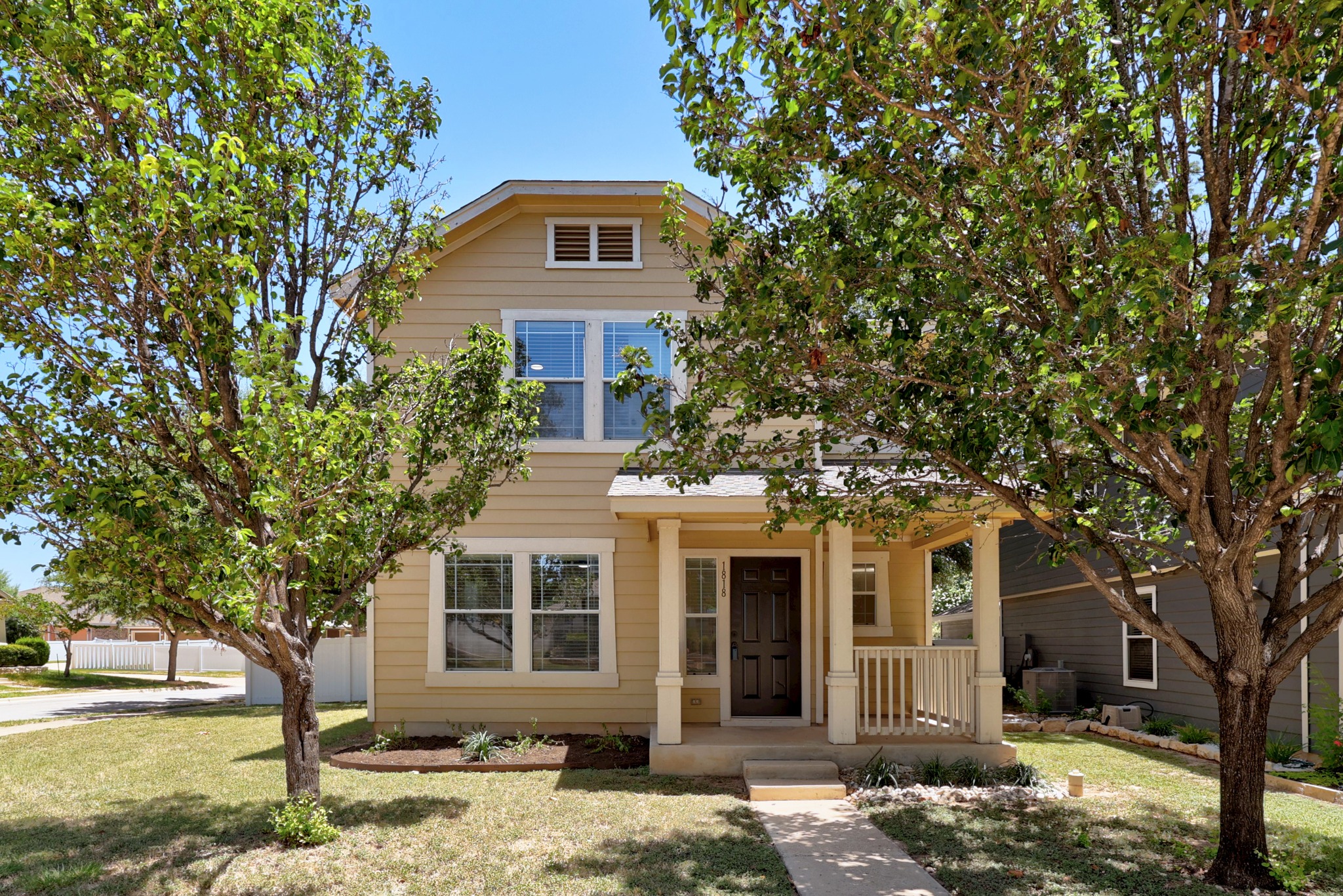 1818 Lost Maples Loop Cedar Park, TX 78613 - Photo 1 of 38 A charming facade features a welcoming covered porch, ideal for shaded enjoyment.