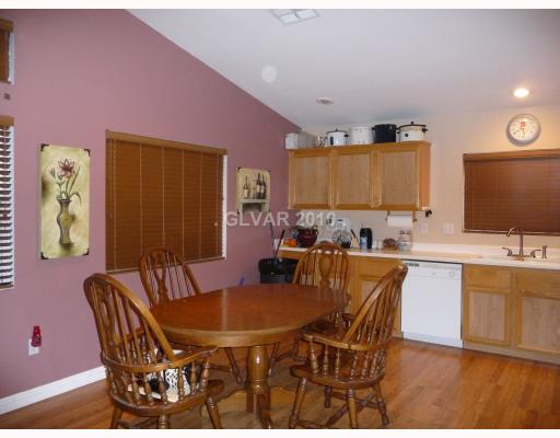 4473 Ranch Foreman Road North Las Vegas, NV 89032 - Photo 5 of 9 Living Room. Open Kitchen with Dining Area