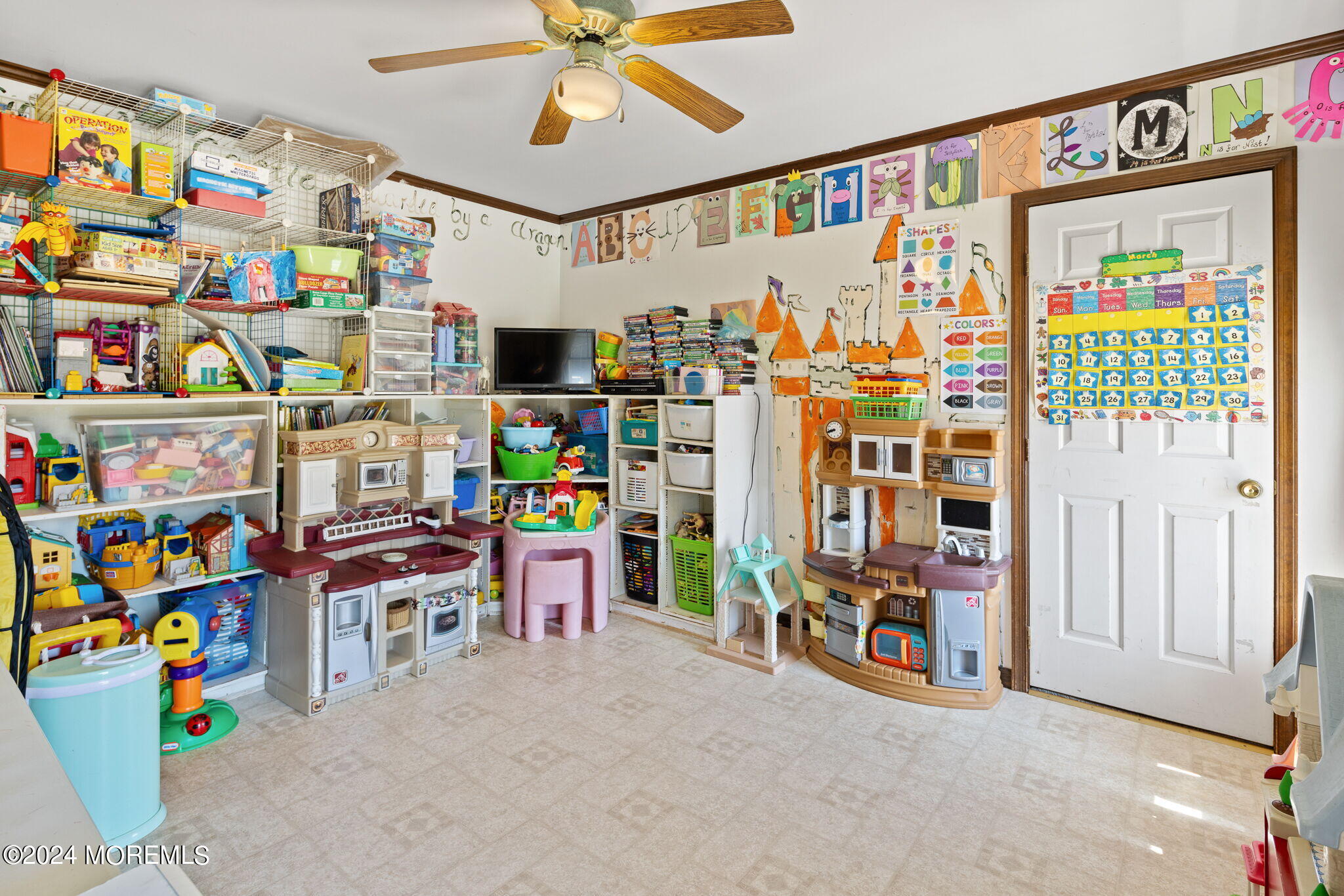 149 Iron Ore Road Manalapan, NJ 07726 - Photo 19 of 35 Playroom/Living Room