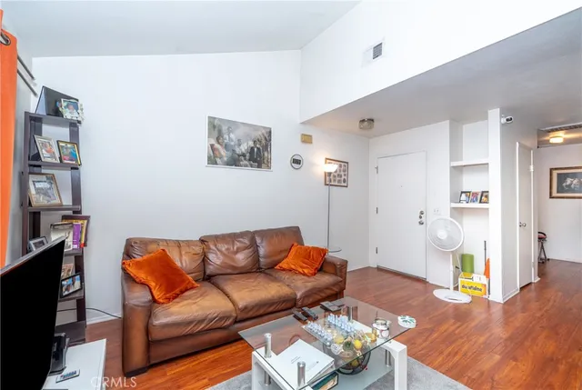 a work room with furniture and a window
