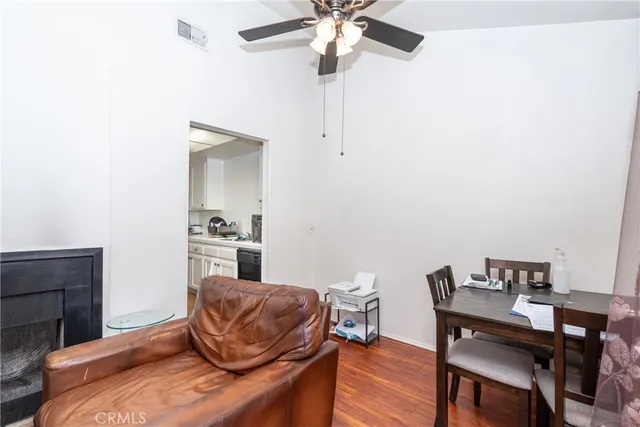 a front view of a house with large windows