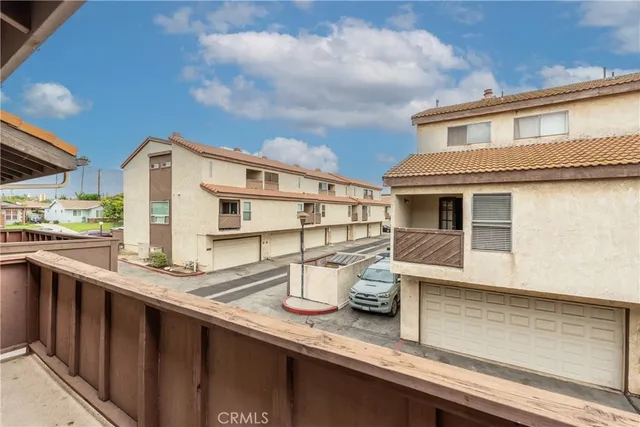 a bedroom with bed and window