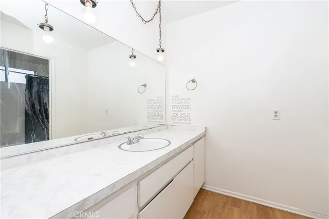a bathroom with a shower and a tub