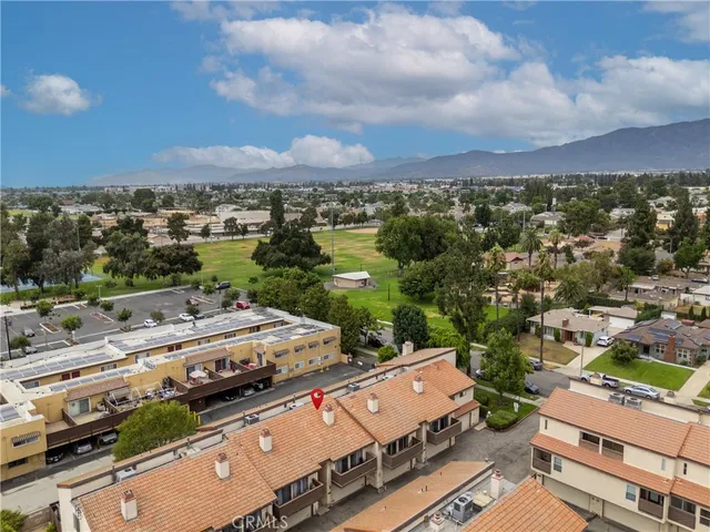 a view of a patio with couches table and chairs