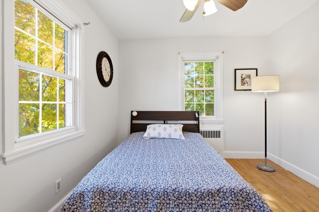 112 Maple Street, Unit 6 Malden, MA 02148 - Photo 15 of 22 a bedroom with a bed and a window