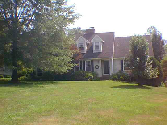 1915 Stillhouse Road Charlottesville, VA 22901 - Photo 1 of 1 a front view of a house with a yard