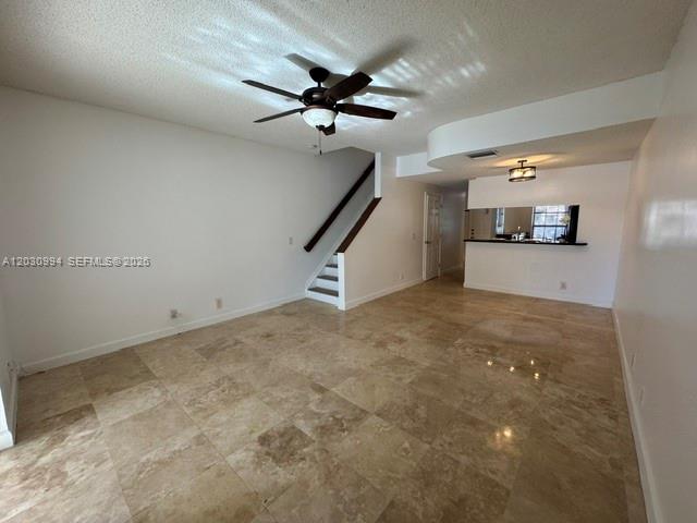 192 Southwest 96th Avenue, Unit 192 Plantation, FL 33324 - Photo 9 of 15 a view of a livingroom with a ceiling fan