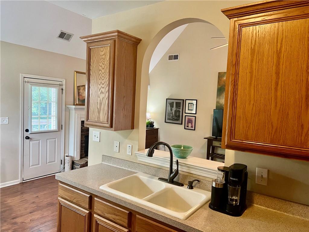 113 Nelson Ridge Drive Ball Ground, GA 30107 - Photo 12 of 33 a bathroom with a sink and a mirror