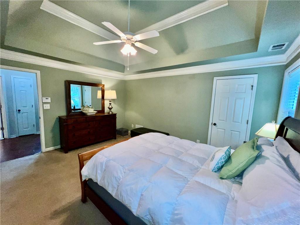 113 Nelson Ridge Drive Ball Ground, GA 30107 - Photo 17 of 33 a bedroom with a bed and window