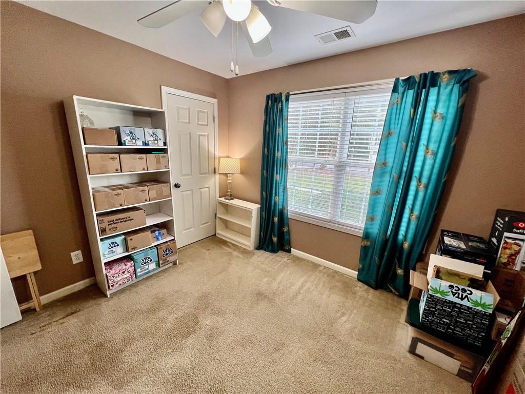 113 Nelson Ridge Drive Ball Ground, GA 30107 - Photo 21 of 33 a view of a room with baby crib and a window