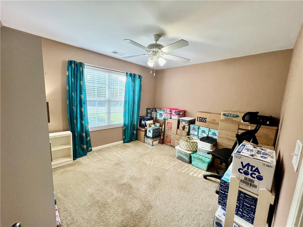 113 Nelson Ridge Drive Ball Ground, GA 30107 - Photo 22 of 33 a bed room with a bed and a window