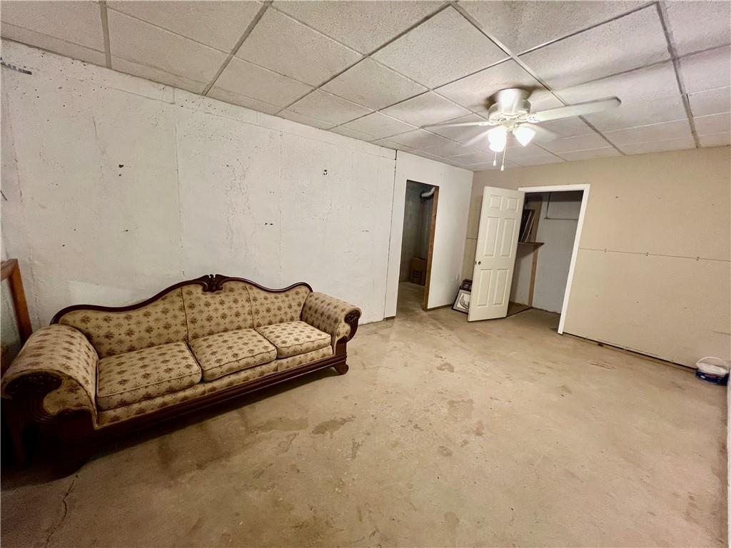 113 Nelson Ridge Drive Ball Ground, GA 30107 - Photo 25 of 33 a bedroom with furniture and a ceiling fan