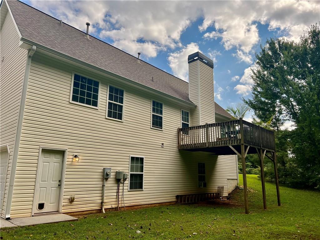 113 Nelson Ridge Drive Ball Ground, GA 30107 - Photo 29 of 33 a view of a house with a yard