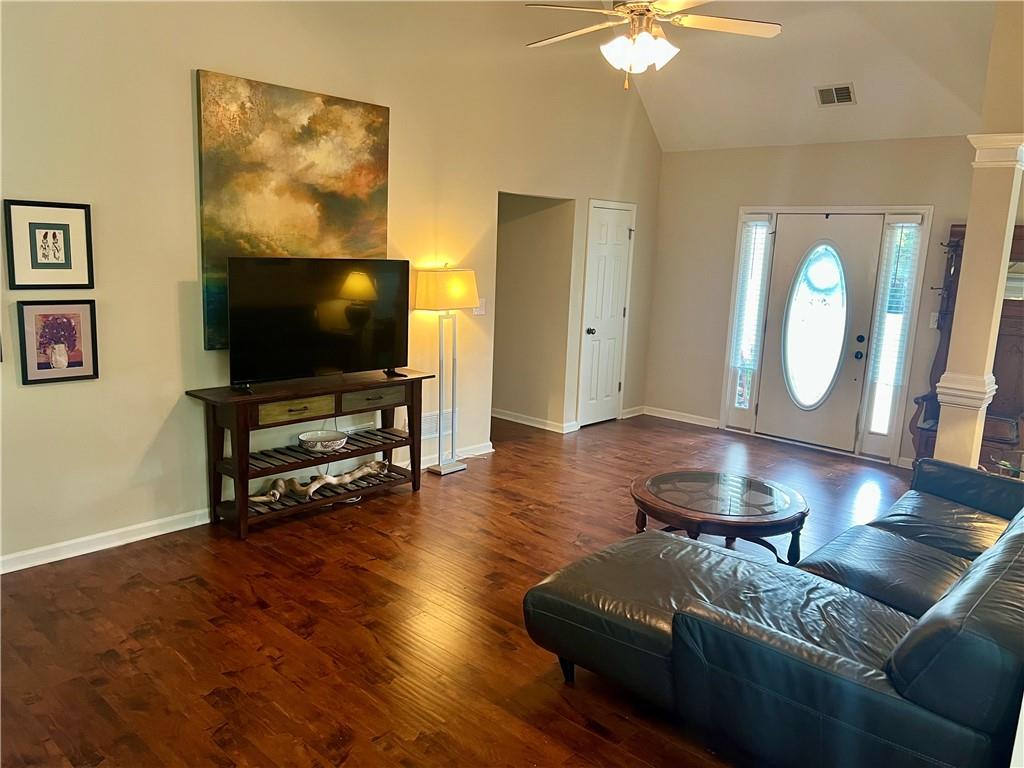 113 Nelson Ridge Drive Ball Ground, GA 30107 - Photo 6 of 33 a living room with furniture and a flat screen tv