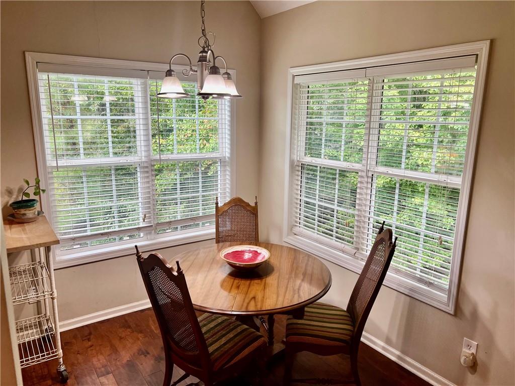 113 Nelson Ridge Drive Ball Ground, GA 30107 - Photo 8 of 33 a view of a dining room with furniture window and outside view