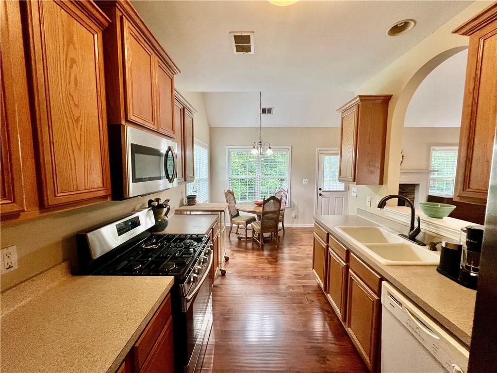 113 Nelson Ridge Drive Ball Ground, GA 30107 - Photo 9 of 33 a kitchen with lots of counter top space