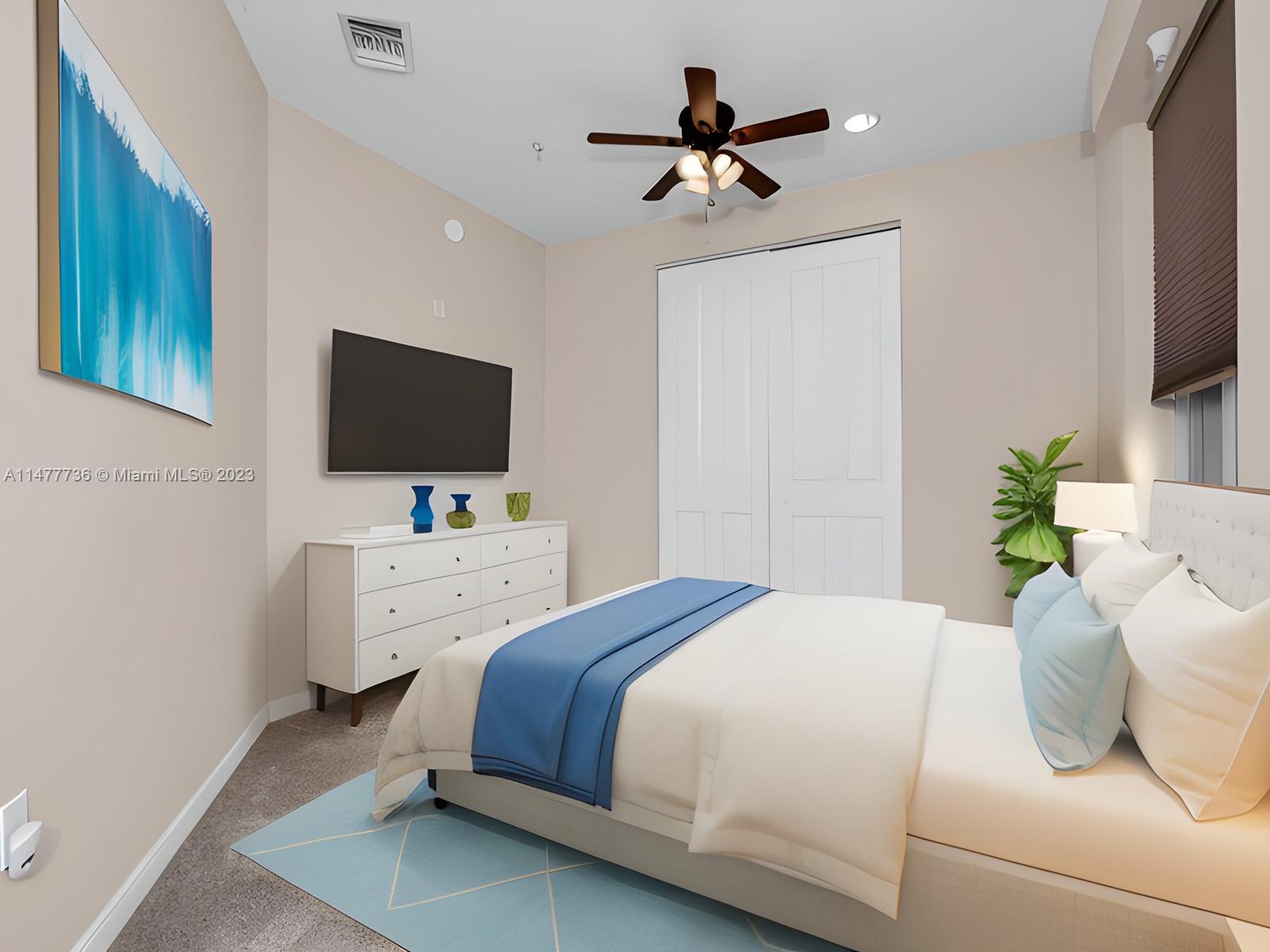Artesia Sunrise, FL 33323 - Photo 12 of 38 a bedroom with a bed and a flat screen tv