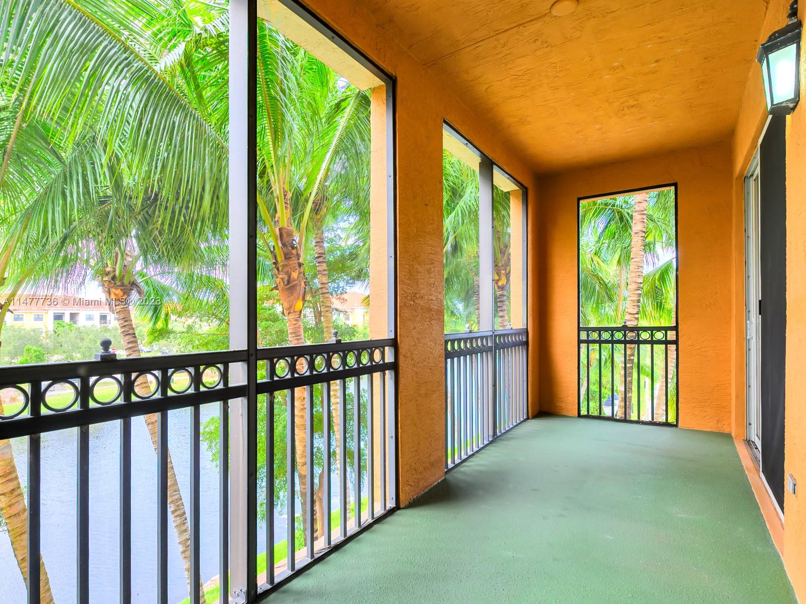 Artesia Sunrise, FL 33323 - Photo 16 of 38 a view of porch with a floor to ceiling window and yard