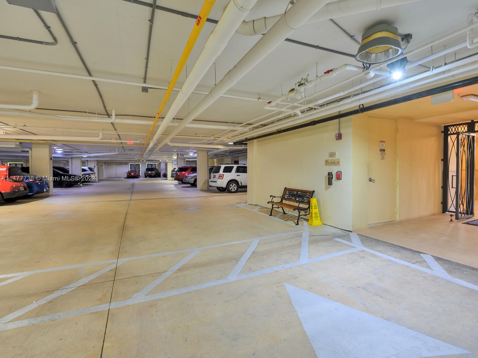 Artesia Sunrise, FL 33323 - Photo 19 of 38 a view of parking garage with cars