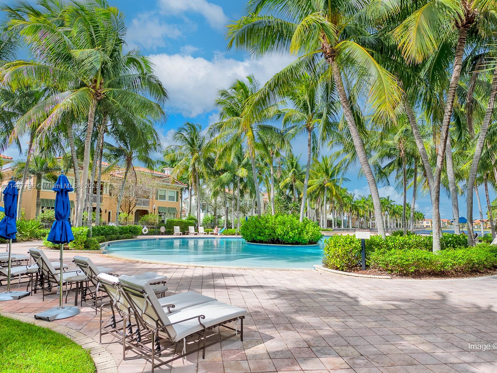Artesia Sunrise, FL 33323 - Photo 20 of 38 a view of a yard with a table and chairs in patio
