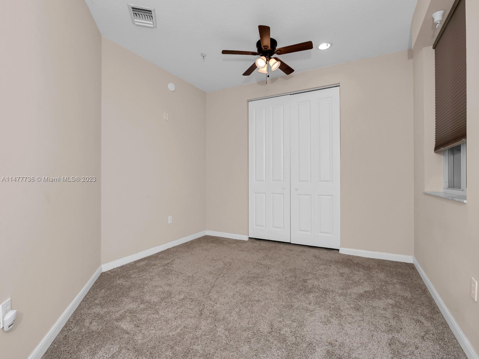 Artesia Sunrise, FL 33323 - Photo 38 of 38 a view of an empty room with a fan