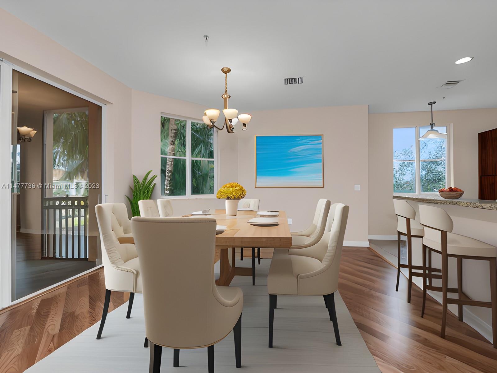 Artesia Sunrise, FL 33323 - Photo 4 of 38 a view of a dining room with furniture window and wooden floor