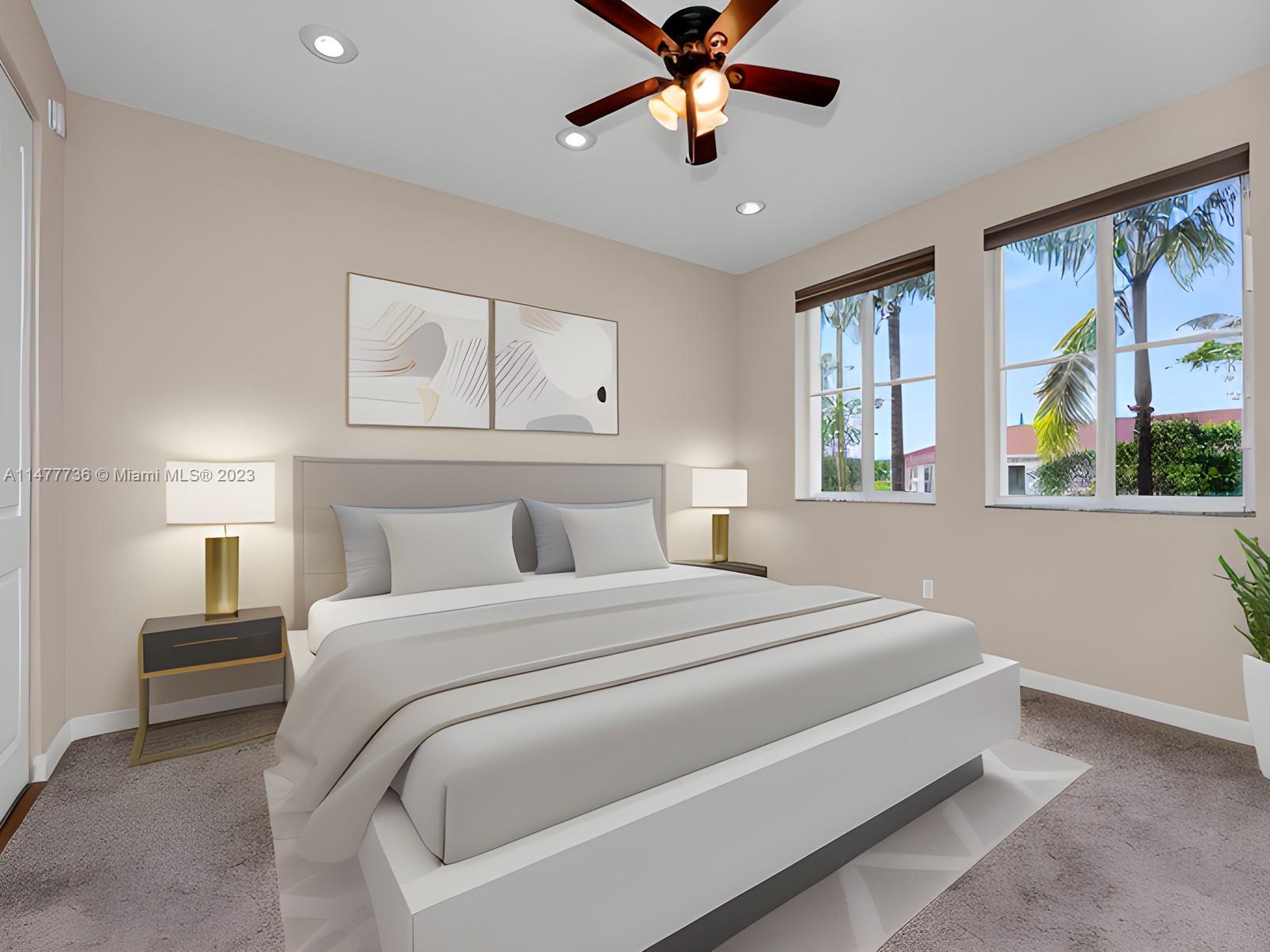 Artesia Sunrise, FL 33323 - Photo 7 of 38 a bedroom with a large bed and a chandelier