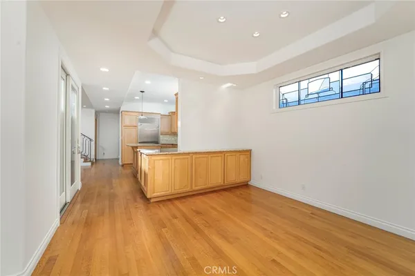 a view of kitchen with wooden floor