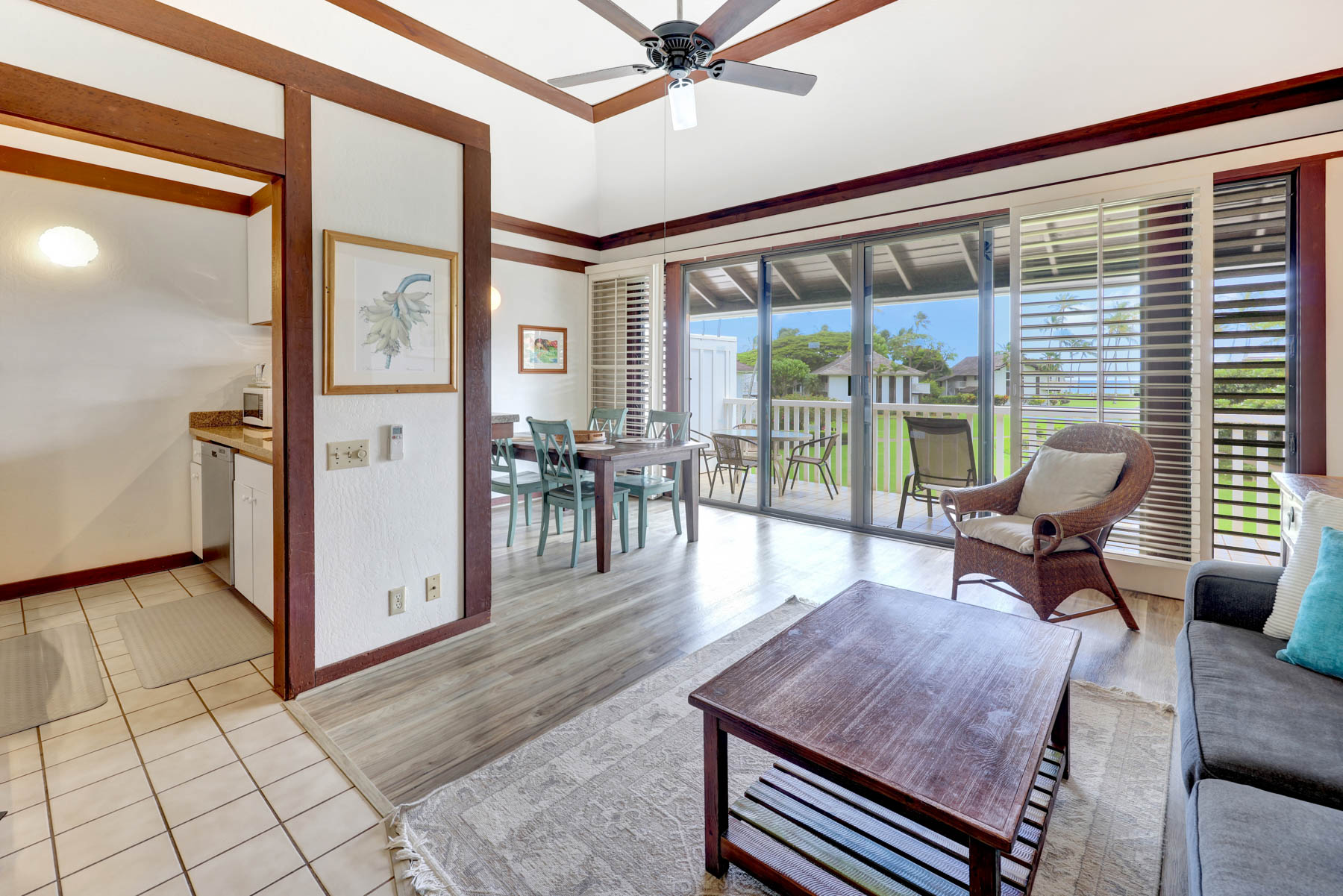 2253 Poipu Road, Unit 138 Koloa, HI 96756 - Photo 2 of 27 a view of a livingroom with furniture and floor to ceiling window