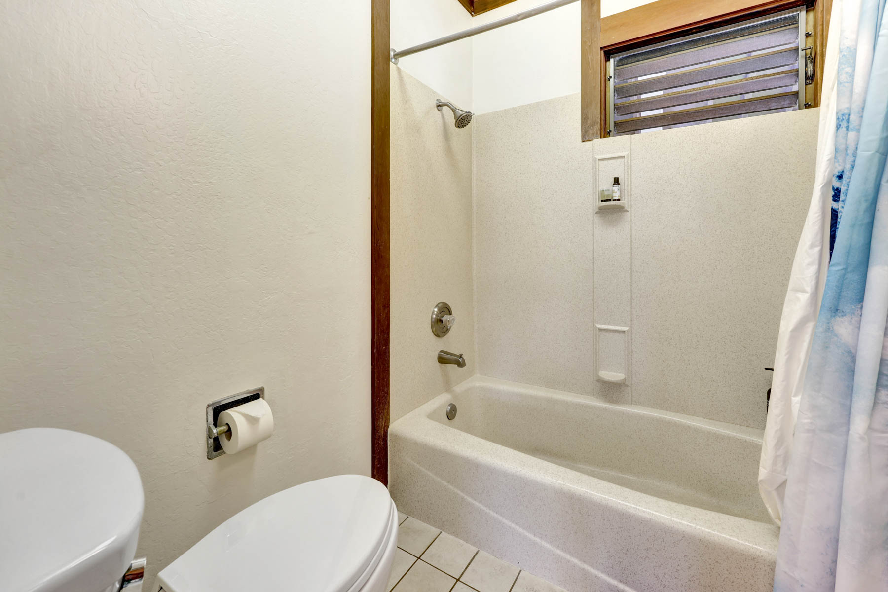 2253 Poipu Road, Unit 138 Koloa, HI 96756 - Photo 26 of 27 a white bath tub sitting next to a white toilet