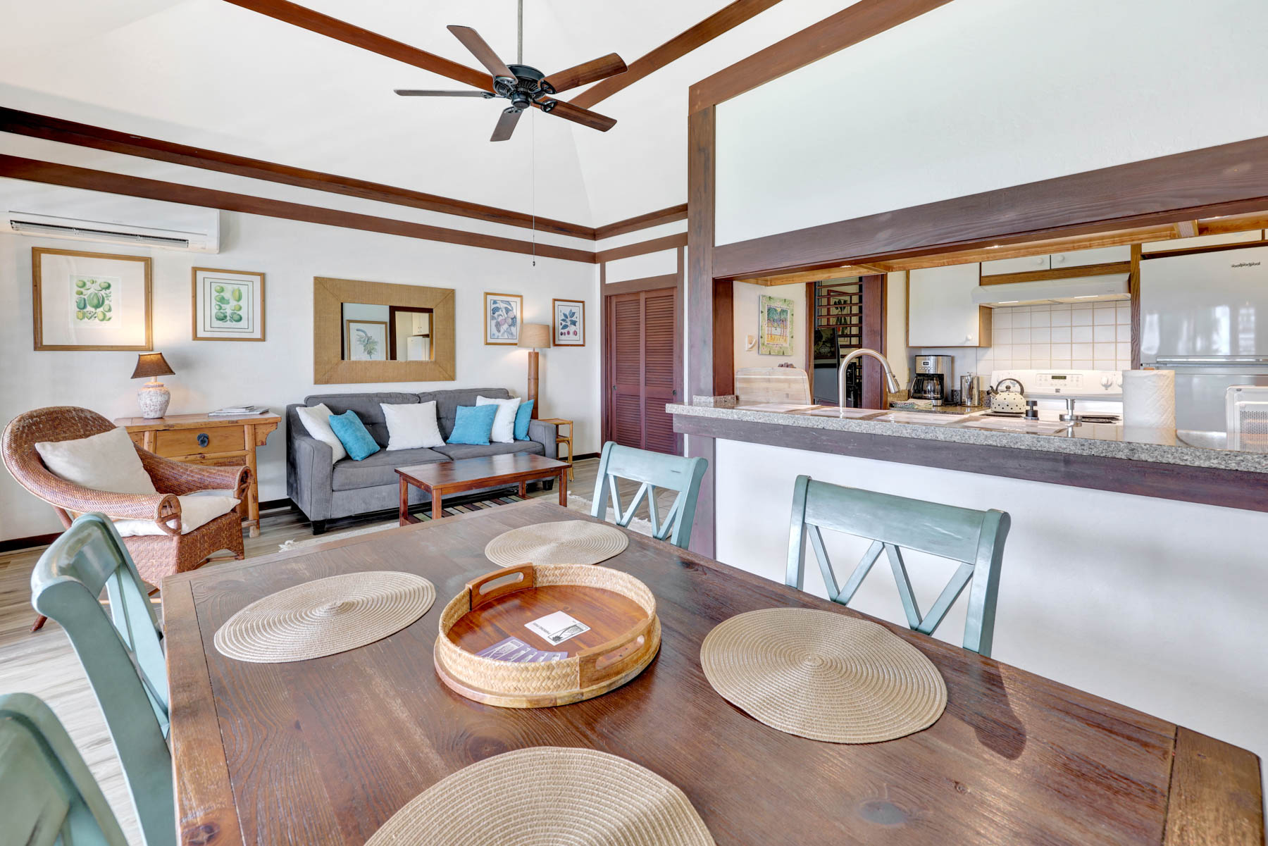 2253 Poipu Road, Unit 138 Koloa, HI 96756 - Photo 6 of 27 a living room with furniture and a table