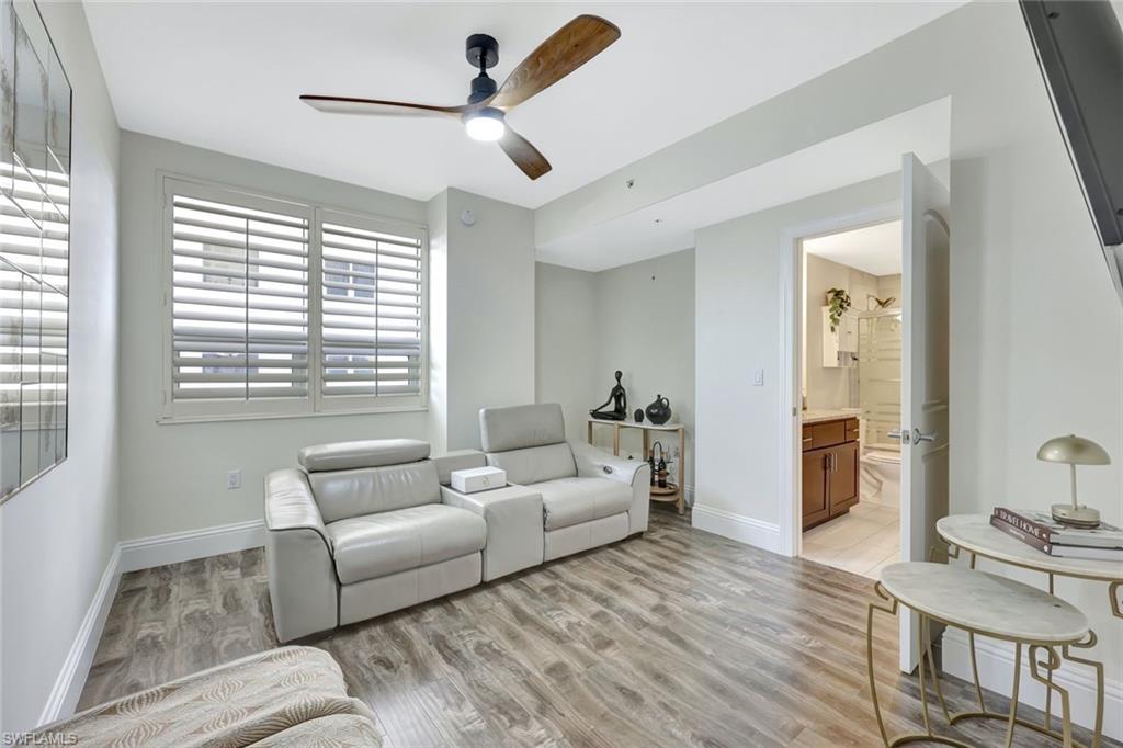 2104 West First Street, Unit 1404 Fort Myers, FL 33901 - Photo 23 of 33 a living room with furniture and a window