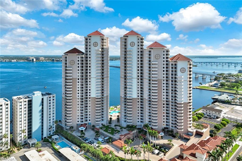 2104 West First Street, Unit 1404 Fort Myers, FL 33901 - Photo 32 of 33 a city view with tall buildings