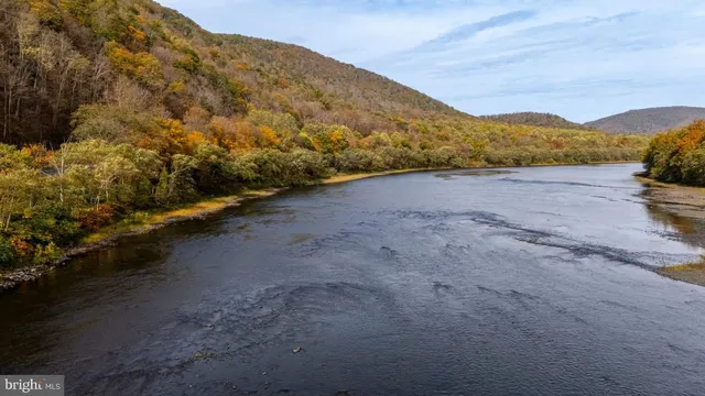 a view of a road with a building in the background
