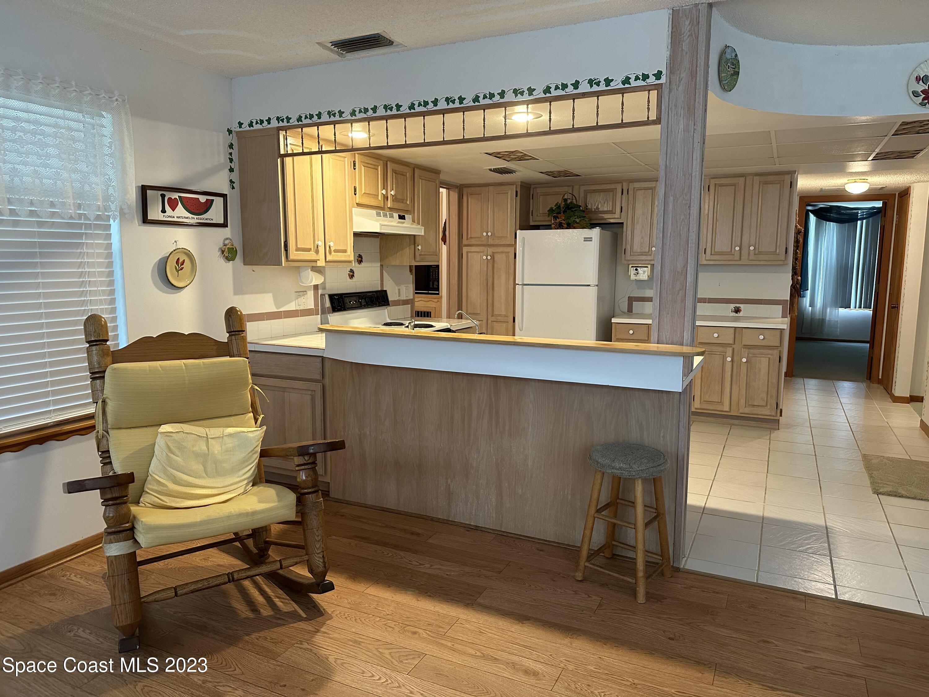 3995 Toby Avenue Malabar, FL 32950 - Photo 14 of 43 a workspace with furniture and window